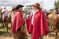 Quechua cowboys in red poncho
