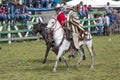 Quechua cowboys wearing poncho outdoors in Ecuador