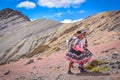 Quechua girls follow trails in the Andes on the Ausangate trek. Cusco, Peru Royalty Free Stock Photo