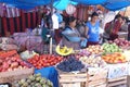 Quechua Indian women bargain and sell vegetables >