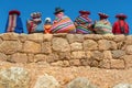 Quechua Indigenous on Inca Wall, Peru Royalty Free Stock Photo