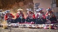 Quechua ladies weaving traditional Andean textiles. Chillca, Cusco, Peru