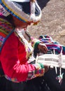 Quechua ladies weaving traditional Andean textiles. Chillca, Cusco, Peru Royalty Free Stock Photo