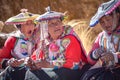 Quechua ladies weaving traditional Andean textiles. Chillca, Cusco, Peru