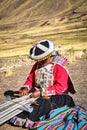 Quechua ladies weaving traditional Andean textiles. Chillca, Cusco, Peru Royalty Free Stock Photo