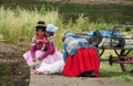 Quechua woman with a child in latin american