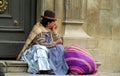 Quechua woman in traditional cloth and hat