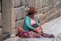 Quechua woman in traditional indigenous clothing, in Cusco, Peru