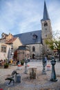 Quedlinburg, Germany, 28 October 2022: Monument near St. Benedict church, Personalities from history, fountain, dog Quedel