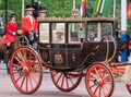 Queen Elizabeth II in a carriage pulled by horses on her way to Buckingham Palace after the Trooping the Colour parade, London UK