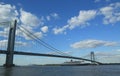 Queen Mary 2 cruise ship in New York Harbor under Verrazano Bridge heading for Transatlantic Crossing from New York to Southampton Royalty Free Stock Photo