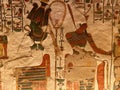 Queen Nefertari tomb in Queens valley in Luxor - Osiris and Atum receiving offerings from Nefertari