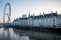 Queen`s Walk, London Eye and County Hall River Building early in the morning