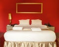 Queen size white bed in bedroom . Royalty Free Stock Photo