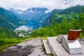 Queen Sony Chair on the Flydalsjuvet Viewpoint. The Geiranger village and Geirangerfjord landscape. Norway Royalty Free Stock Photo