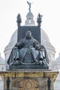 Queen Victoria Monument with Victoria Memorial`s central dome in the background. Kolkata, India. A vertical version