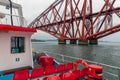 Launch boat making a round trip near Forth Railroad Bridge