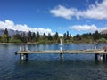 Queenstown Waterfront turquoise crystal clear water on sunny day Royalty Free Stock Photo