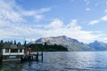 Queentown / New Zealand - 2 December 2017: water observatory office and small ship harbour at lake side in sunny day