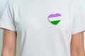 Queer Pride Day and LGBT pride month concept. purple, white and green heart shape for Lesbian, Gay, Bisexual, Transgender,