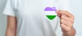 Queer Pride Day and LGBT pride month concept. purple, white and green heart shape for Lesbian, Gay, Bisexual, Transgender,