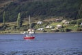 QUELLON, CHILE. Colourful fishing boats in the coastal town of Quellon on the island of Chiloe in Chile