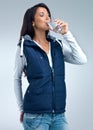 Quenching her thirst. A studio shot of a beautiful woman drinking a glass of water. Royalty Free Stock Photo