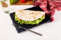 quesadilla with meat, sauce, cheese, tomato and salad leaves Royalty Free Stock Photo