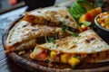 Quesadilla - Mexican dish served with mango salsa Royalty Free Stock Photo