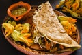 Quesadillas with squash blossom, cheese and sauce mexican food