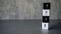 Question and answer concept. Stack of black and white cube with a symbol of question mark Royalty Free Stock Photo
