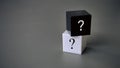 Question and answer concept. Stack of black and white cube with a symbol of question mark Royalty Free Stock Photo