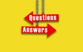 Question Answers Written on red Arrow. symbol Hanging Arrows With metal chain on yellow background. Business Help and Support