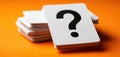 The question card standing out amidst a stack of blank playing cards. AI generated image Royalty Free Stock Photo