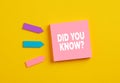 The question did you know on pink note paper. Tips and information for help in business or education Royalty Free Stock Photo