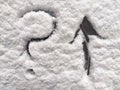 A question mark and arrow written in the snow. The cold frosty texture of the snow and the question mark. Background Royalty Free Stock Photo