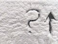 A question mark and arrow written in the snow. The cold frosty texture of the snow and the question mark. Background Royalty Free Stock Photo