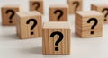 Question mark blocks wooden cubes uncertainty doubt confusion problem solving quiz riddle challenge answer solution knowledge info Royalty Free Stock Photo