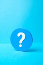 A question mark in a blue circle. FAQ and surveys. Ask a question. Get information Royalty Free Stock Photo