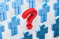 Question mark among blue human figures croud Royalty Free Stock Photo