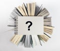 Question mark on books. Knowledge and curiosity concept