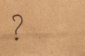 A question mark is drawn on brown paper Royalty Free Stock Photo