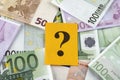Question mark on euro banknotes