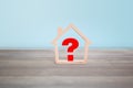 Question mark with house on wood table , Problem Concept Royalty Free Stock Photo