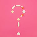 Question mark laid out of pills of various shapes Royalty Free Stock Photo