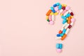 Question mark made of lots of pills and capsules. Royalty Free Stock Photo