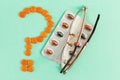 Question mark made of pills and spectacles Royalty Free Stock Photo