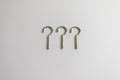 Question mark of screws on isolated white background or conceptual sign Royalty Free Stock Photo