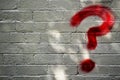 Question mark sign painted on brick wall Royalty Free Stock Photo