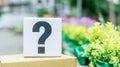 Question mark standing on a cardboard box, symbolizing inquiry, doubt, problems, and searching for answers Royalty Free Stock Photo